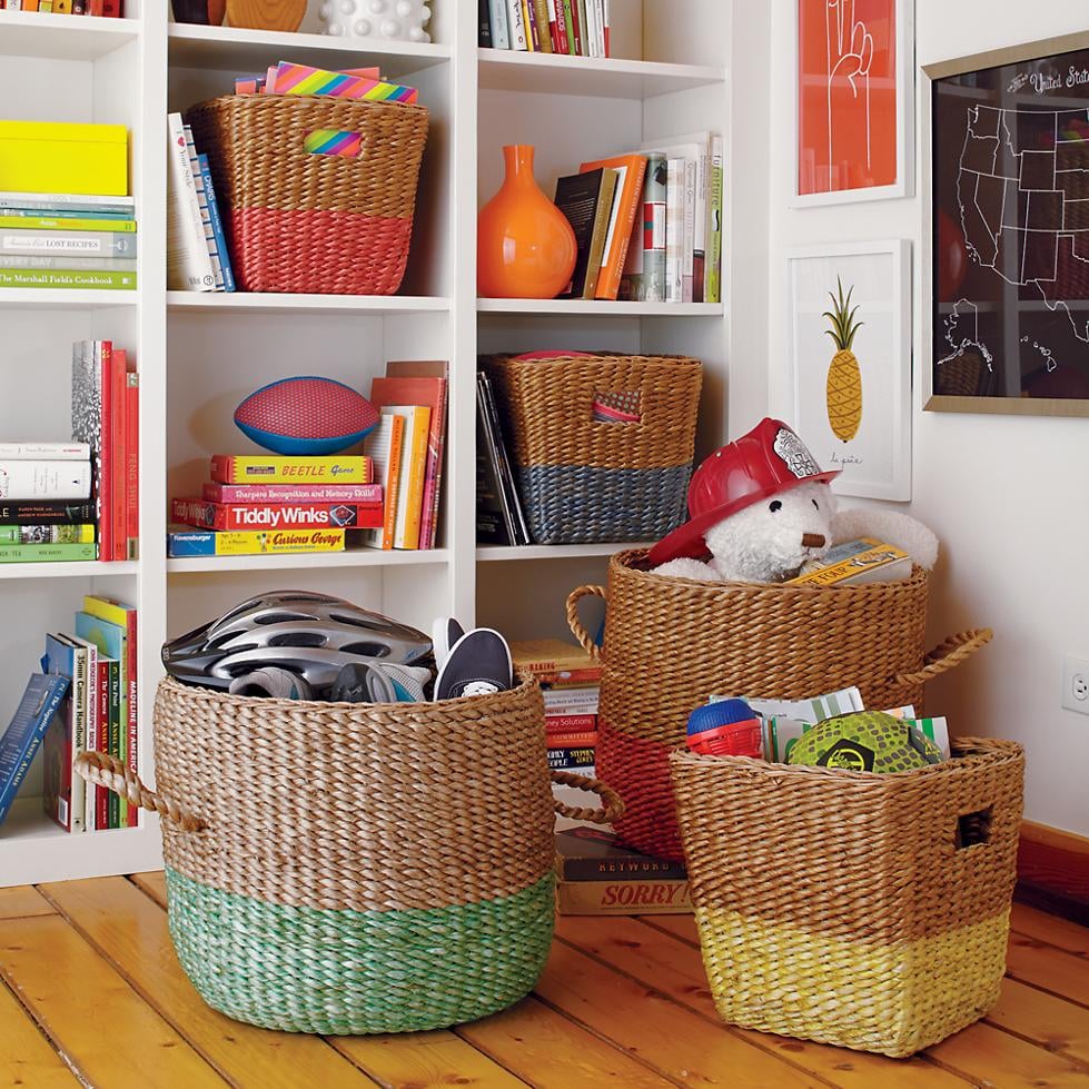 Incorporate storage baskets into the project. They come in various shapes and sizes and are great for storing blankets, stuffed animals, and toys. The ones with flat tops can double as a place to set a book on top. — Julie Rootes Interiors