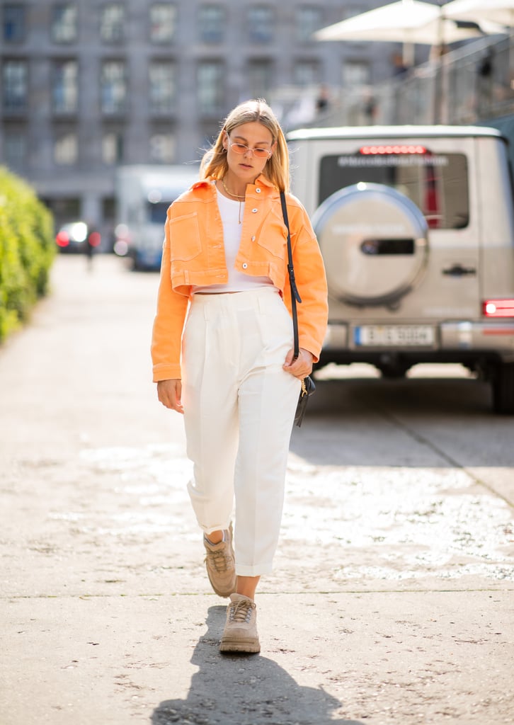 Wear white high-waisted pants with confidence — then add in a boxy cropped jacket in a bright colour to take them to the next level.
