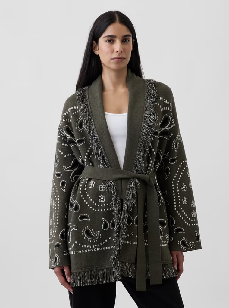 Gap Cotton-Blend Fringe Shawl Cardigan ($168)
Western accents are on every fall mood board this year, and this cardigan is no exception. Mixing the trendy theme with comfort, the relaxed design is complete with a fringe trim and paisley pattern, and there are three neutral colorways to choose from.