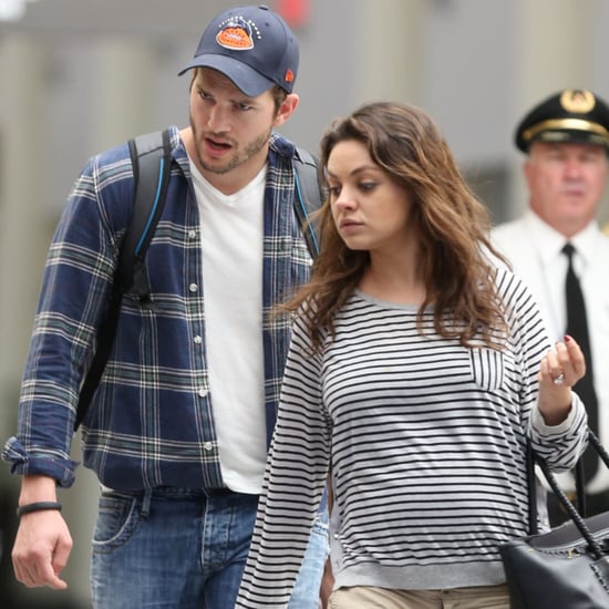 Mila Kunis Shows Baby Bump at Airport With Ashton Kutcher