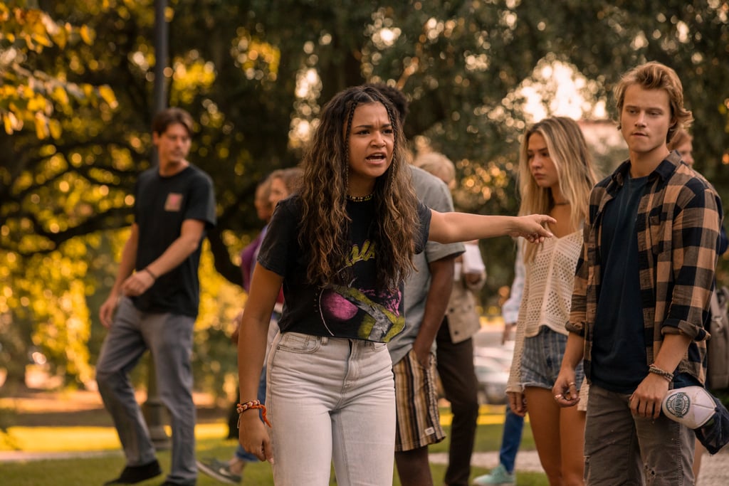 Kiara's David Bowie T-Shirt and Light-Wash Jeans on Outer Banks Season 2