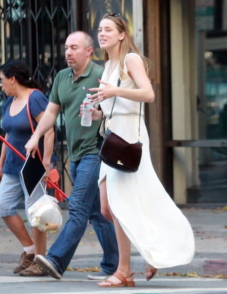 Amber Heard wore a flowing off-white dress in LA on Friday.