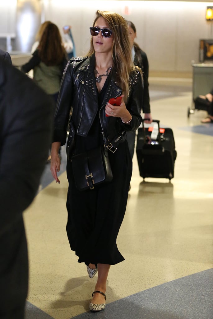 A leather jacket isn't likely to look as cool with your sweatpants as it does with Jessica Alba's just-as-comfortable day dress and snake-print flats, and Carrera sunglasses.