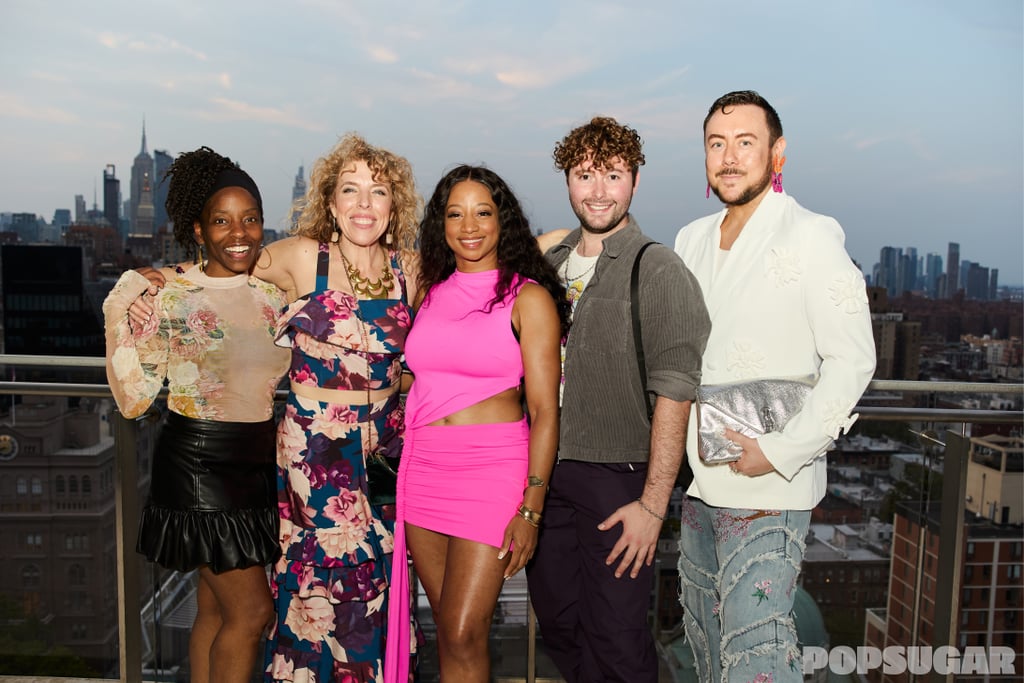 Monique Coleman and her guests pose outside.