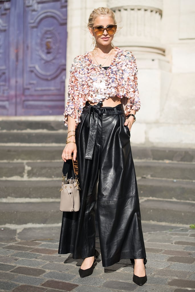 One of our favorite looks spotted in Paris was this sequin top and knotted leather pants combo.
One of our favorite looks spotted in Paris was this sequin top and knotted leather pants combo.