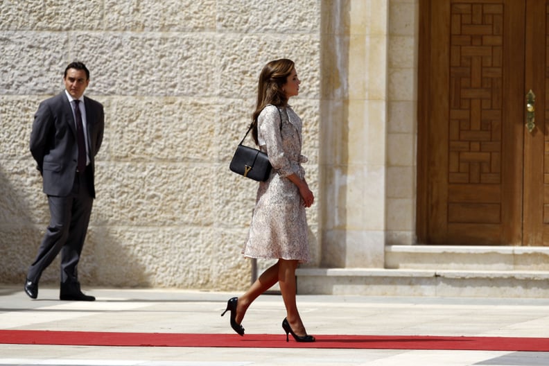 Queen Rania stuns in £4,000 coat and brand-new Louis Vuitton bag