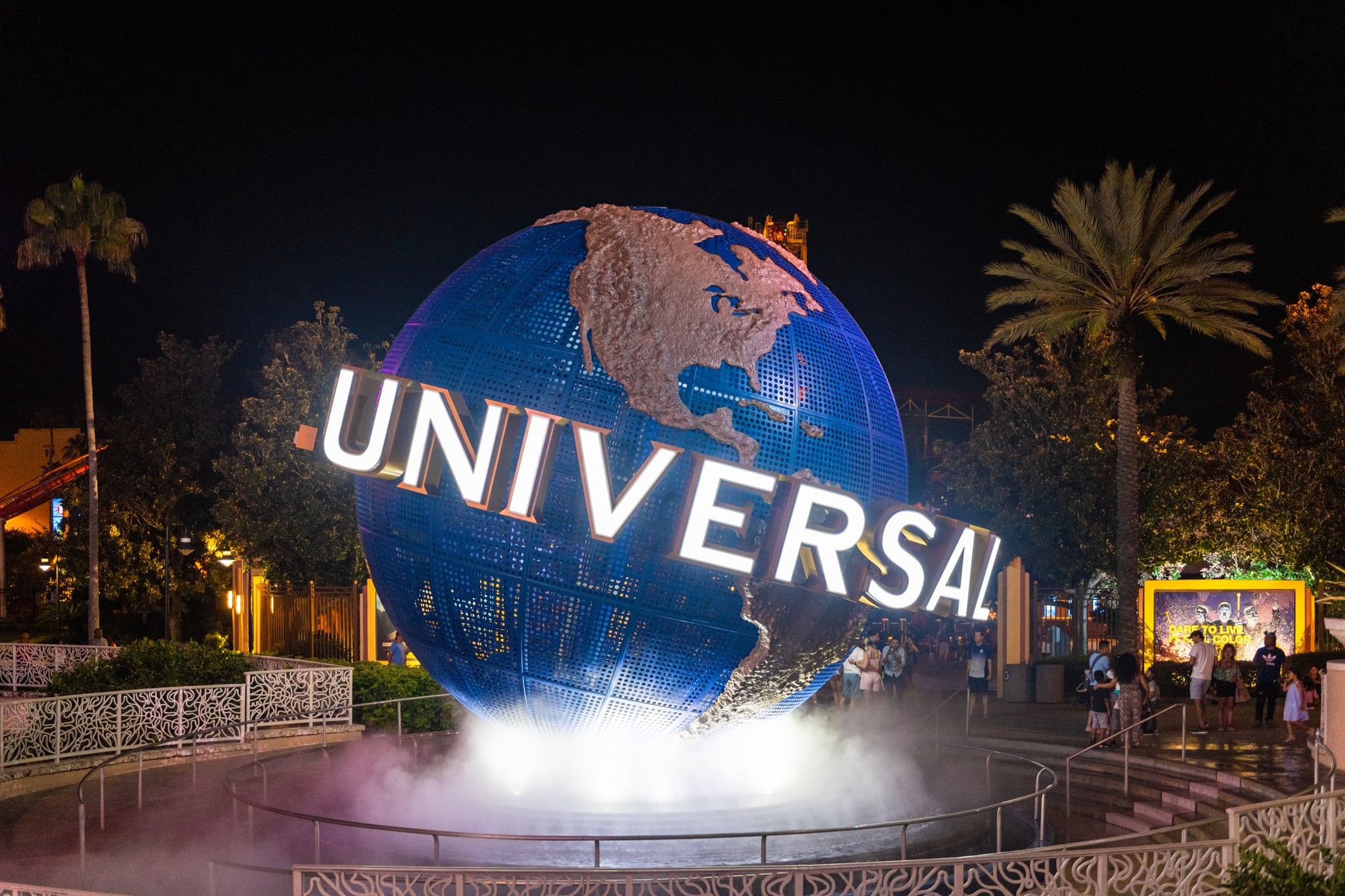 ORLANDO, FLORIDA, UNITED STATES - 2019/07/18: The 3d logo of Universal Studios is seen during the nighttime at the entrance of one of the themed parks in the area. The place is a famous tourist attraction in Florida. (Photo by Roberto Machado Noa/LightRocket via Getty Images)