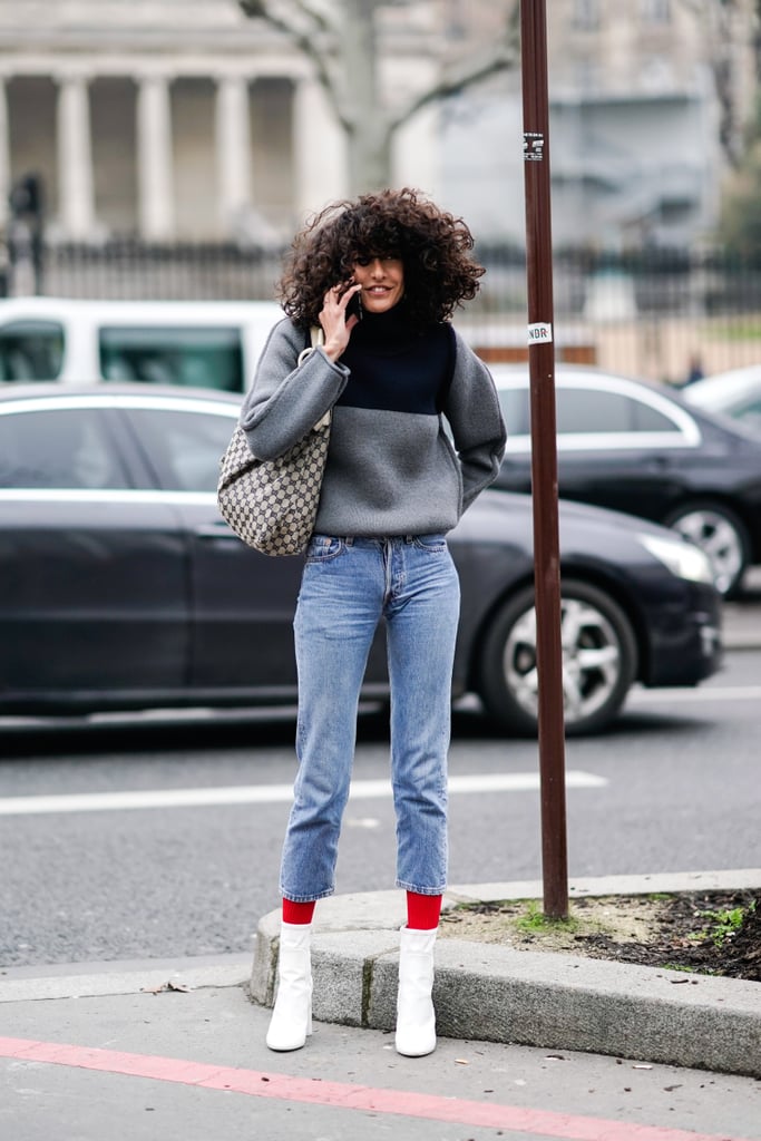 Over Red Socks Tucked Into White Boots