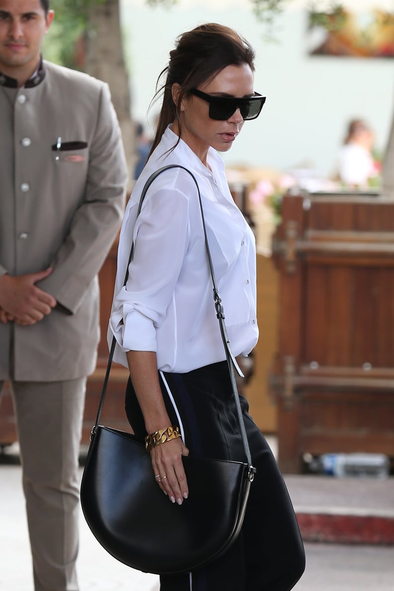 To Finish Off Her Sleek Airport Outfit in Cannes