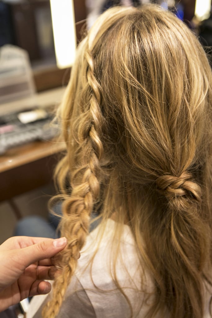 Continue to braid all the way down, and pull at the braid to give it extra texture and width before securing with an elastic.