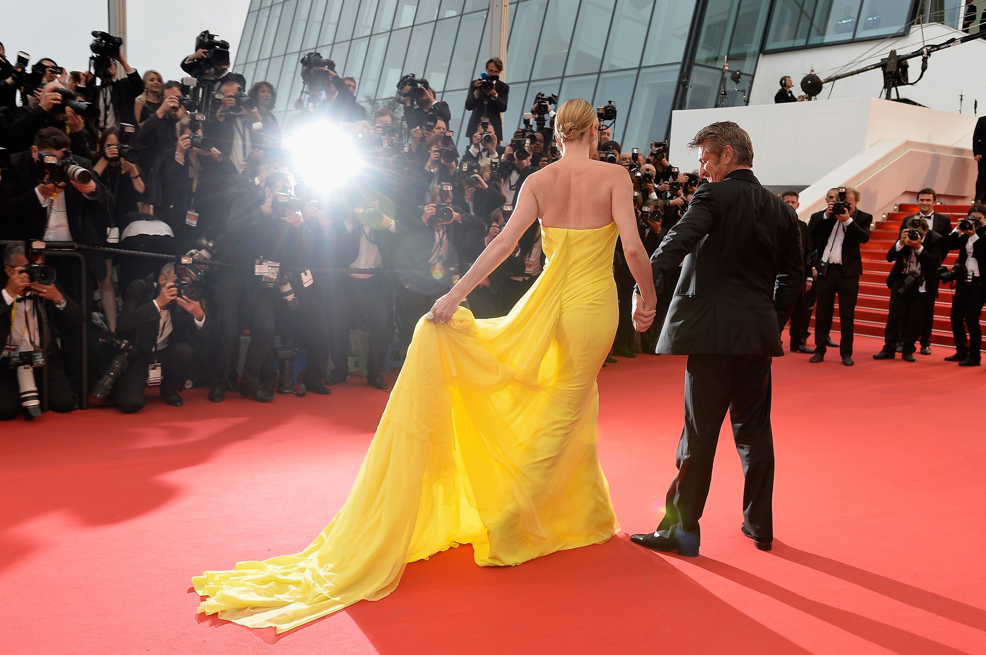 Charlize shines at Cannes while Sean Penn takes a step back
