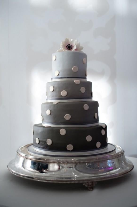 Ombré gray tiers modernize this cake's polka-dot detail.