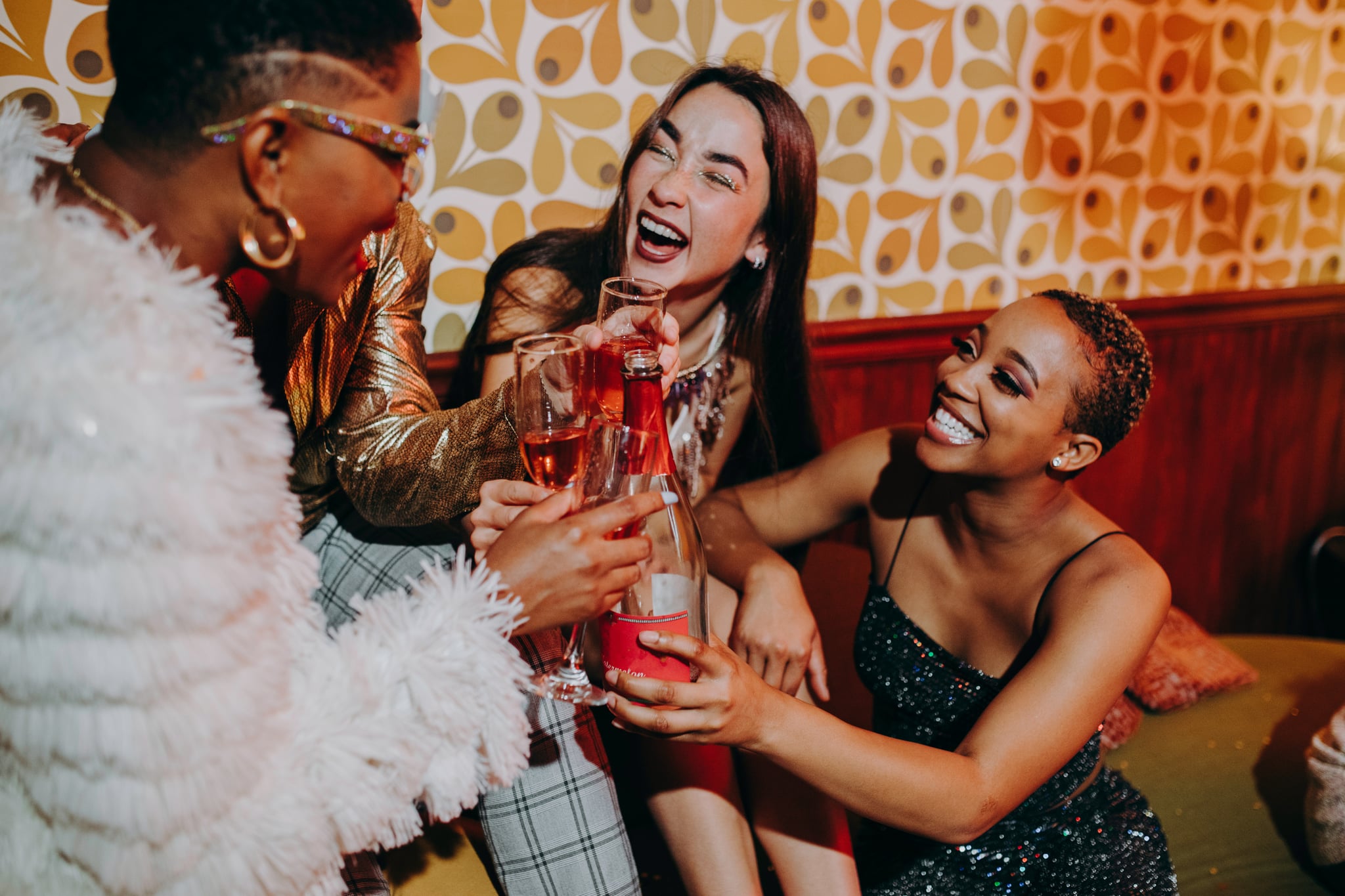 friends celebrating holiday party during Sagittarius season