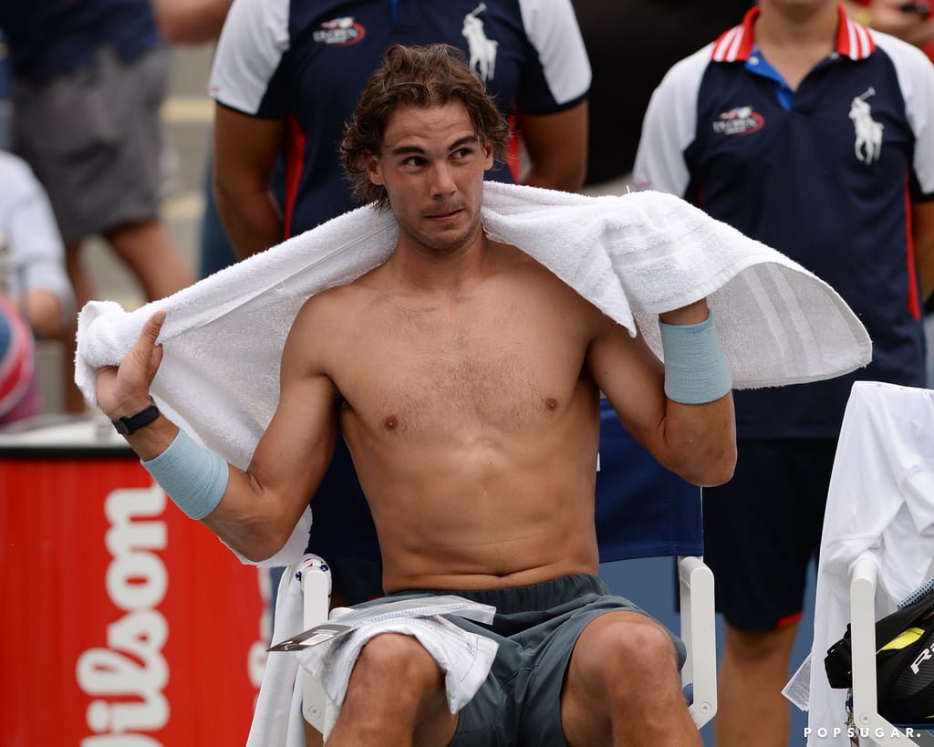 Rafael Nadal showed off his shirtless body after his set. 