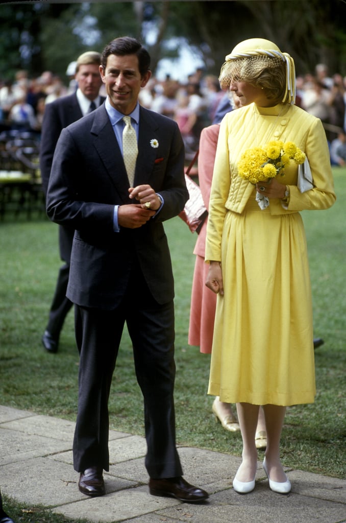 The queen of color that she was, Diana also proudly wore this bold shade, marking her appearance at the Bay of Islands in 1983 in this fresh dress-and-hat combo with yellow roses as her accessory. Like Markle, she also selected neutral-toned footwear.