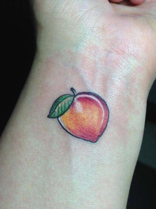 Peach Wrist Tattoo