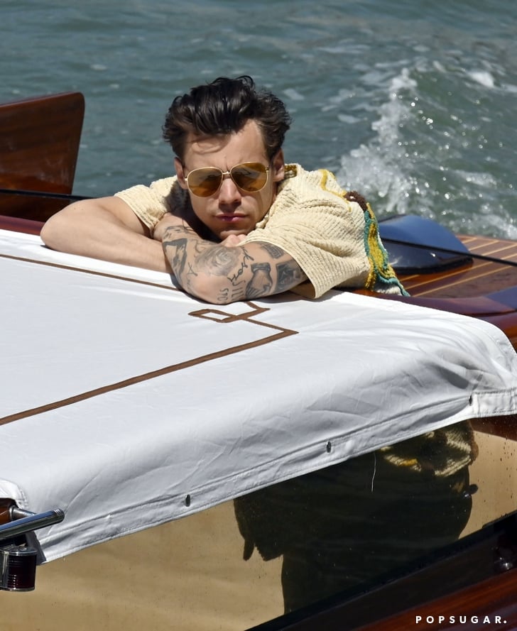 Harry Styles Wearing Vans Sneakers on a Boat in Italy