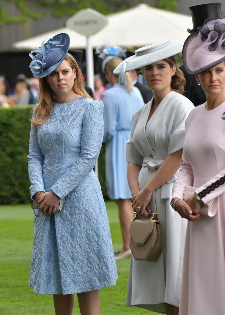 Earlier that day, they both attended Royal Ascot alongside other members of the royal family. For the occasion, Eugenie wore a sophisticated ivory wrap dress cinched at the waist with a bow. Beatrice kept things simple with a pastel blue dress designed by Claire Mischevani.