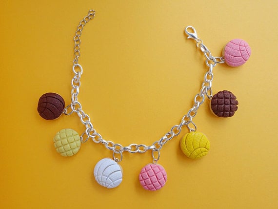 A bracelet for a little arm candy. Concha Pan Dulce Charm Bracelet ($27)