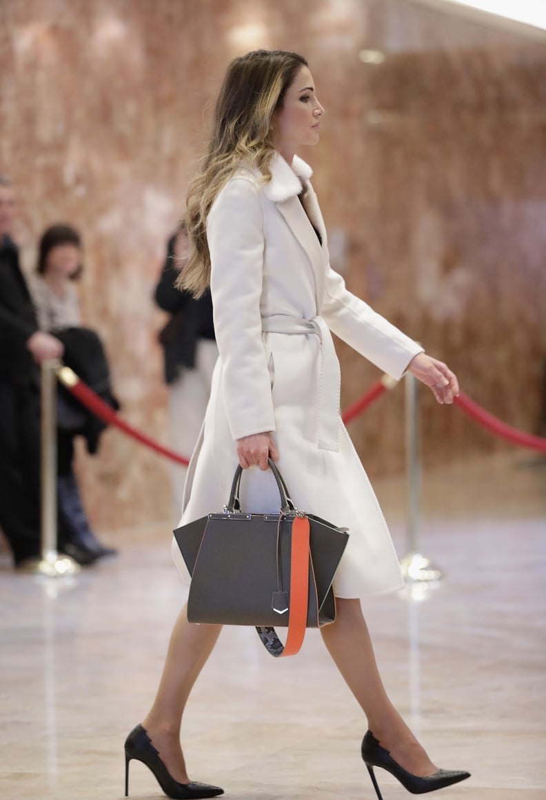 She's a Fan of Fendi's Strap You Collection, Affixing an Orange Design Onto Her Tote