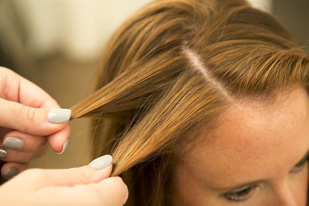 To start your waterfall twist, take two sections of hair.
Source: Caroline Voagen Nelson To start your waterfall twist, take two sections of hair.
Source: Caroline Voagen Nelson