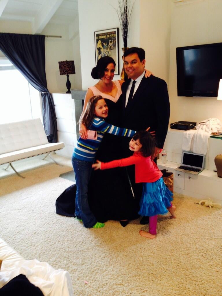 Source: Twitter user lopezbobby
Kristen and Bobby have two daughters, Katie, 8, and Annie, 4, who have both seen Frozen countless times — and are even featured in the film. Their youngest daughter voices the baby troll. The girls got in on the Oscars fun by sending their parents off before the show and crafting a special necklace for their dad out of pasta in the event that he won. Kristen presented the homemade "EGOT" necklace to him in the press room since Bobby's Oscar win makes him an EGOT winner as well — having also picked up an Emmy, Grammy, and three Tonys.