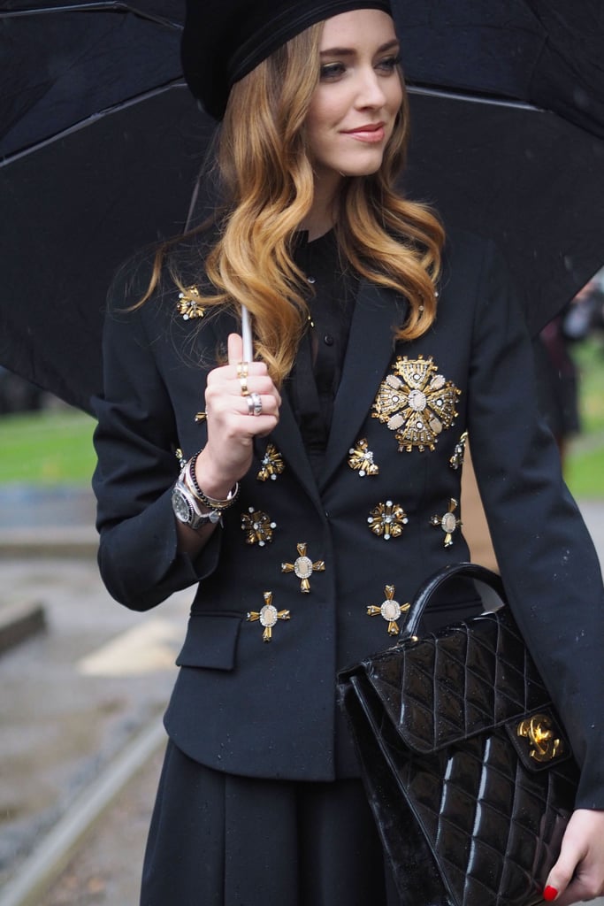 Chiara Ferragni balances both fashion-forward and totally practical accessories. 
Source: Tim Regas