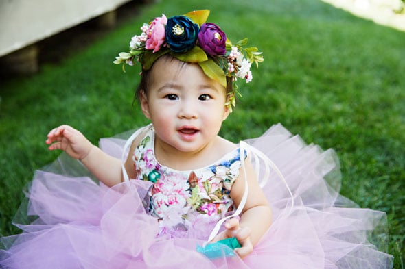 Nothing could spoil this absolutely perfect party! That first year goes so fast with a little one and it’s amazing for friends and family to see just how much that little beauty has grown in a year! What a great idea for a birthday extravaganza for an adorable baby girl!
CREDITS & RESOURCES
Planning: Sandy a la Mode // Venue: Georgell Doll Shop at Gardner Village  //  Photography: Diana Putnam Photography  //  Paper Circle Backdrop: KMHallberg Design  //  Floral Garlands: KMHallberg Design  //  Tablecloth: DinDinDecor  //  Garlands and Paper Flower "1": The Lovely Ave  //  Sugar Cookies: The Fix Utah  //  Cotton Candy: Pink Beehive Cotton Candy  //  Chocolate Desserts, Pretzels: Summer Time Sweets  //  Cake, Fruit Tarts, Macarons, Cupcakes: Sprinkle and Dash   //  Cake Topper: Little Dovie   //  Vivian Turns One Garland: Little Dovie   //  Fresh Flowers: La Belle Fleur   //  Birthday Chalkboard: Pearl Pear Designs   //  Party In A Box paper designs: Happy Confetti   //  Floral Design: Canary Jane   //  5×5 Instagram Prints: Pro Digital Photos   //  ONE Gold Balloons: It’s My Perfect Party   //  Headband (custom): Czarina’s Project   //  Dress: Wrare Doll   //  Shoes: Love Winnie James