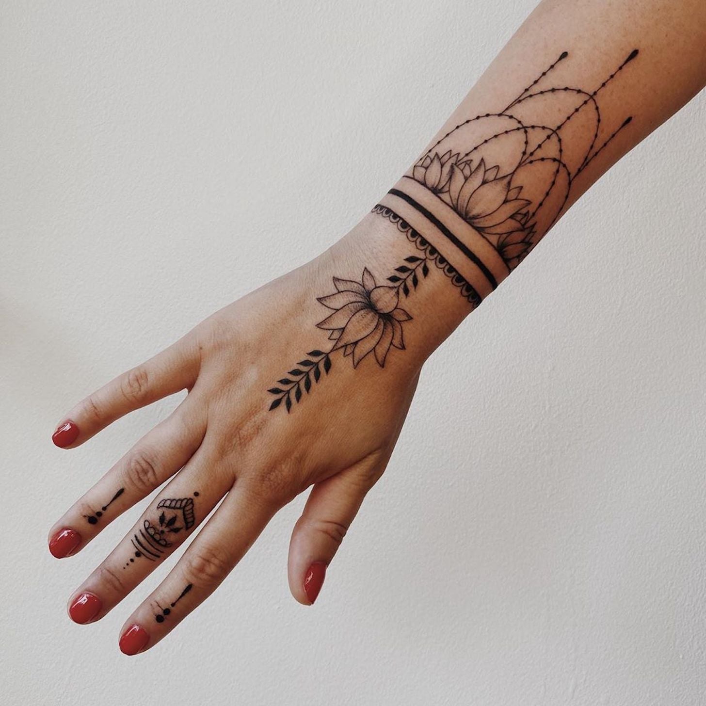 Pin on tattooed hands