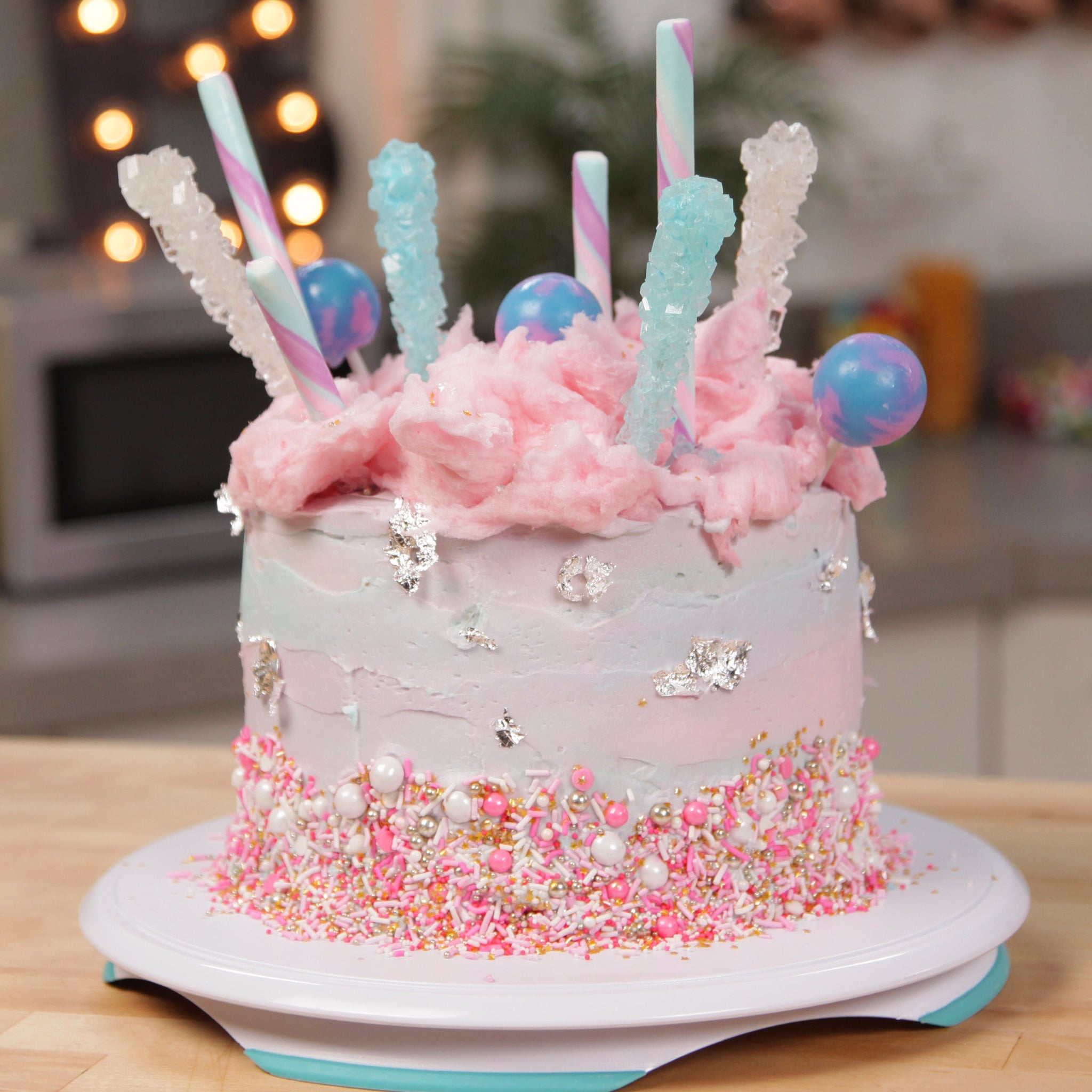 Shop for Fresh Layer Dripping Delicious Cake with Lots of Candies and  Lollipop online - Ambala