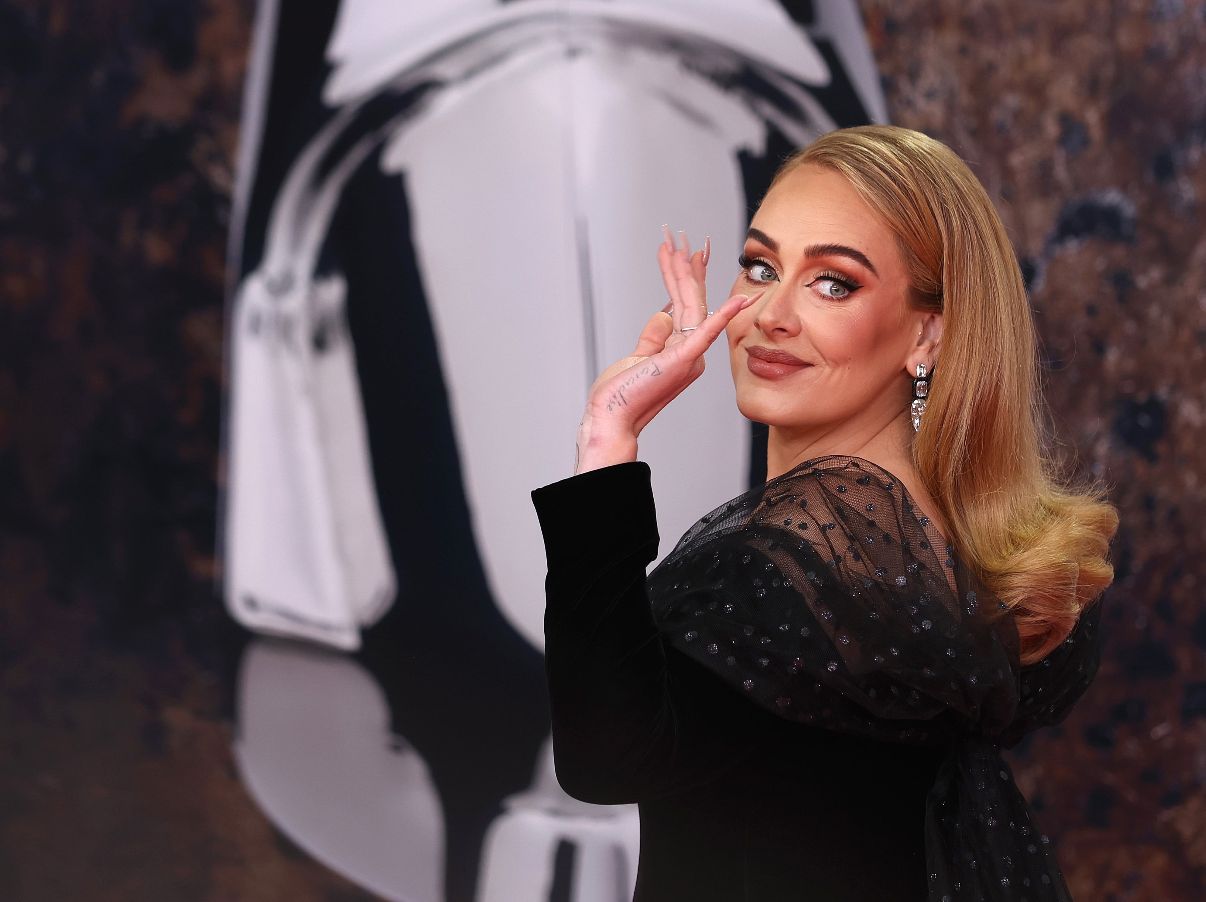 Adele denies Rich Paul engagement rumors