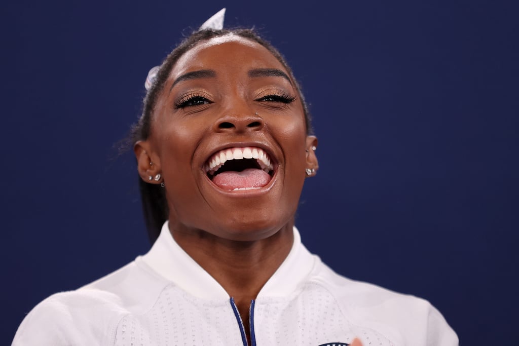 Simone Biles Cheers on Her Olympic Teammates During Finals