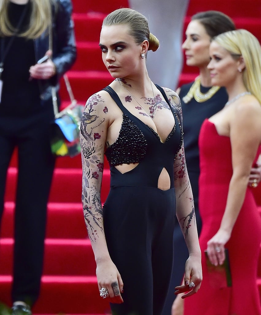 Cara showed up at last year's Met Gala covered in fake fashion tattoos.