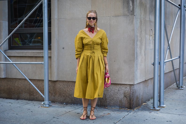 Style a Yellow Dress With a Red Neck Scarf