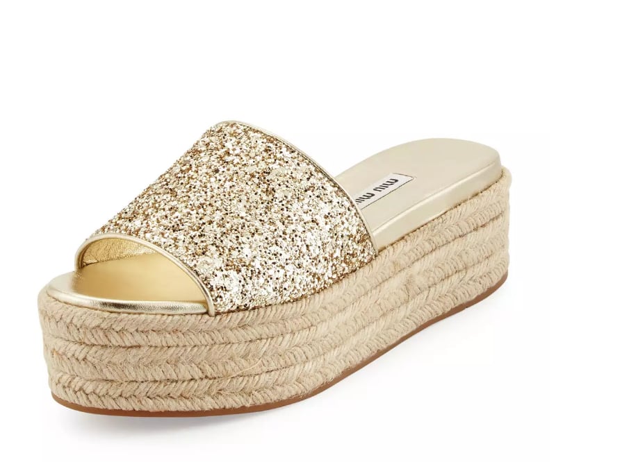 "Easy to slip on, sparkly, and a height boost? Why aren't these Miu Miu Glitter Platform Espadrilles ($475) already on my feet?!" — SS