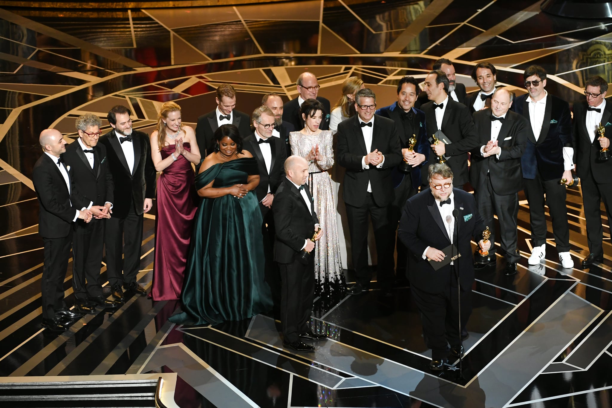 HOLLYWOOD, CA - MARCH 04:  Producer J. Miles Dale (L), director Guillermo del Toro (at microphone) and cast/crew accept Best Picture for 'The Shape of Water' onstage during the 90th Annual Academy Awards at the Dolby Theatre at Hollywood & Highland Center on March 4, 2018 in Hollywood, California.  (Photo by Kevin Winter/Getty Images)