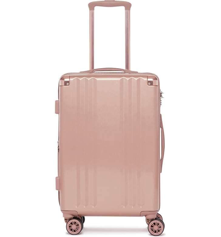 A Pink Suitcase Calpak Ambeur 22Inch Rolling Spinner CarryOn Best