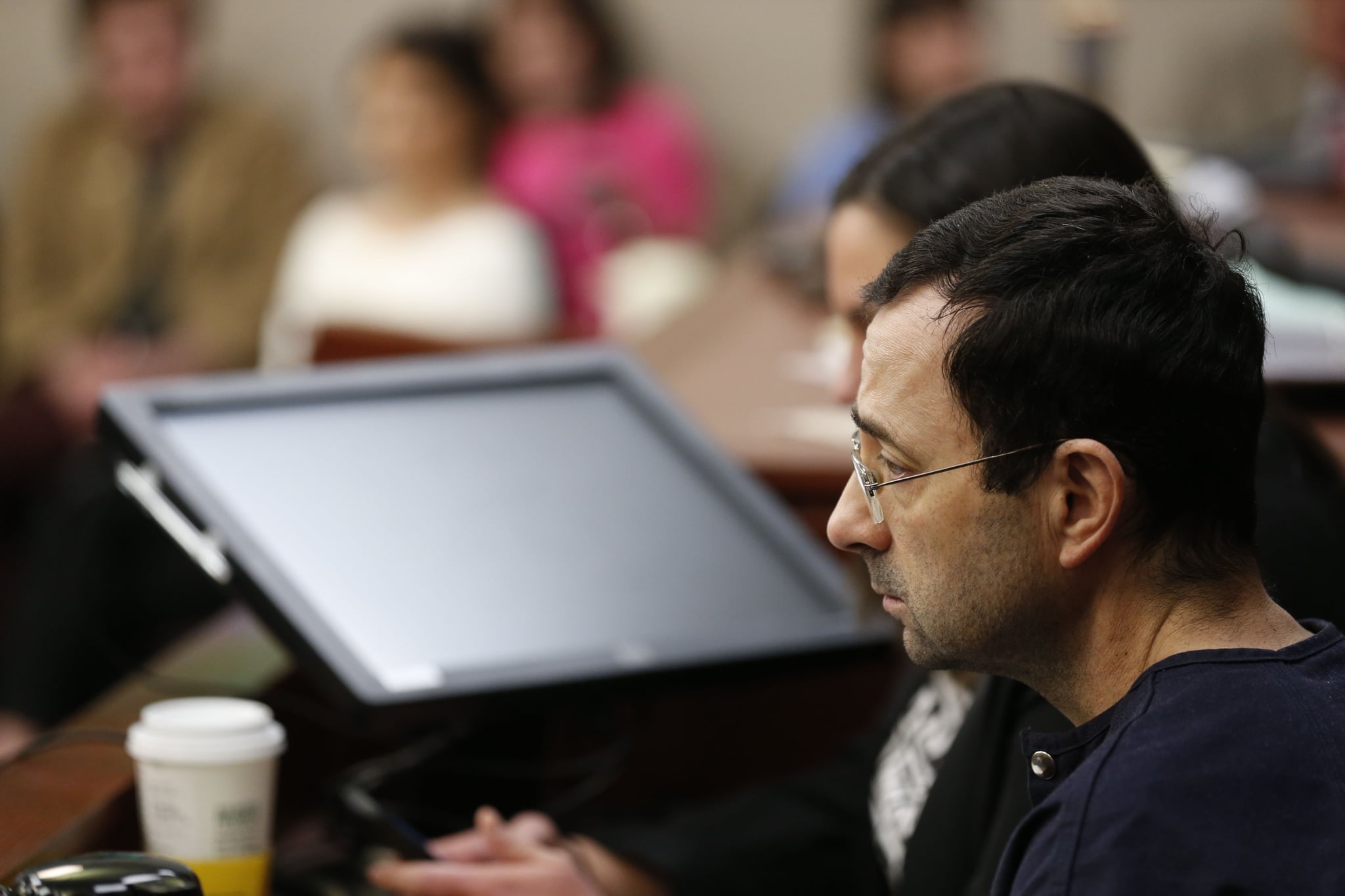 Former Michigan State University and USA Gymnastics doctor Larry Nassar gives an impact statement during the sentencing phase in Ingham County Circuit Court on January 24, 2018 in Lansing, Michigan.More than 100 women and girls accuse Nassar of a pattern of serial abuse dating back two decades, including the Olympic gold-medal winners Simone Biles, Aly Raisman, Gabby Douglas and McKayla Maroney -- who have lashed out at top sporting officials for failing to stop him. / AFP PHOTO / JEFF KOWALSKY (Photo credit should read JEFF KOWALSKY/AFP via Getty Images)