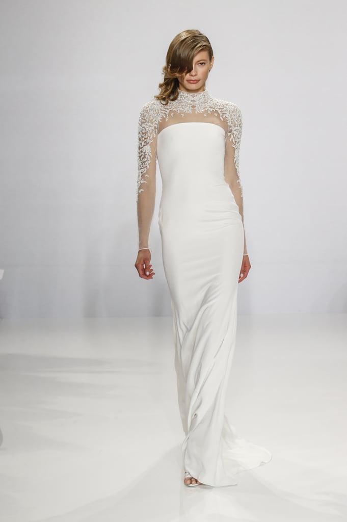 Embroidered sleeve column gown.
