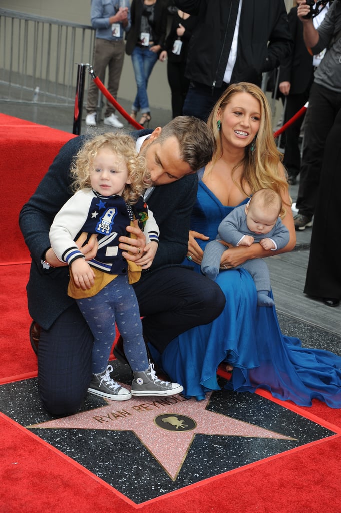 On Dec. 16, 2014, their first daughter, James, was born. She was named after Ryan's father. The couple later welcomed a second daughter, Inez — "with a z," as Blake later confirmed to the media — in 2016. The family of four made their first red carpet appearance together when Ryan received his star on the Hollywood Walk of Fame.
Blake apparently drove Ryan to the hospital once when she was giving birth. And Ryan played "Let's Get It On" (as a joke) while Blake was in labor with their first child — which she didn't find very funny in the moment.
They're pretty obsessed with their kids. Aside from the proud parents occasionally sharing adorable anecdotes in interviews (like having to explain anniversaries and talking about how Inez loves steak), Ryan often tweets funny scenarios involving his children. Plus, who can forget how excited they were to hear their daughter's voice at a Taylor Swift concert? (James is featured at the beginning of the song "Gorgeous.")