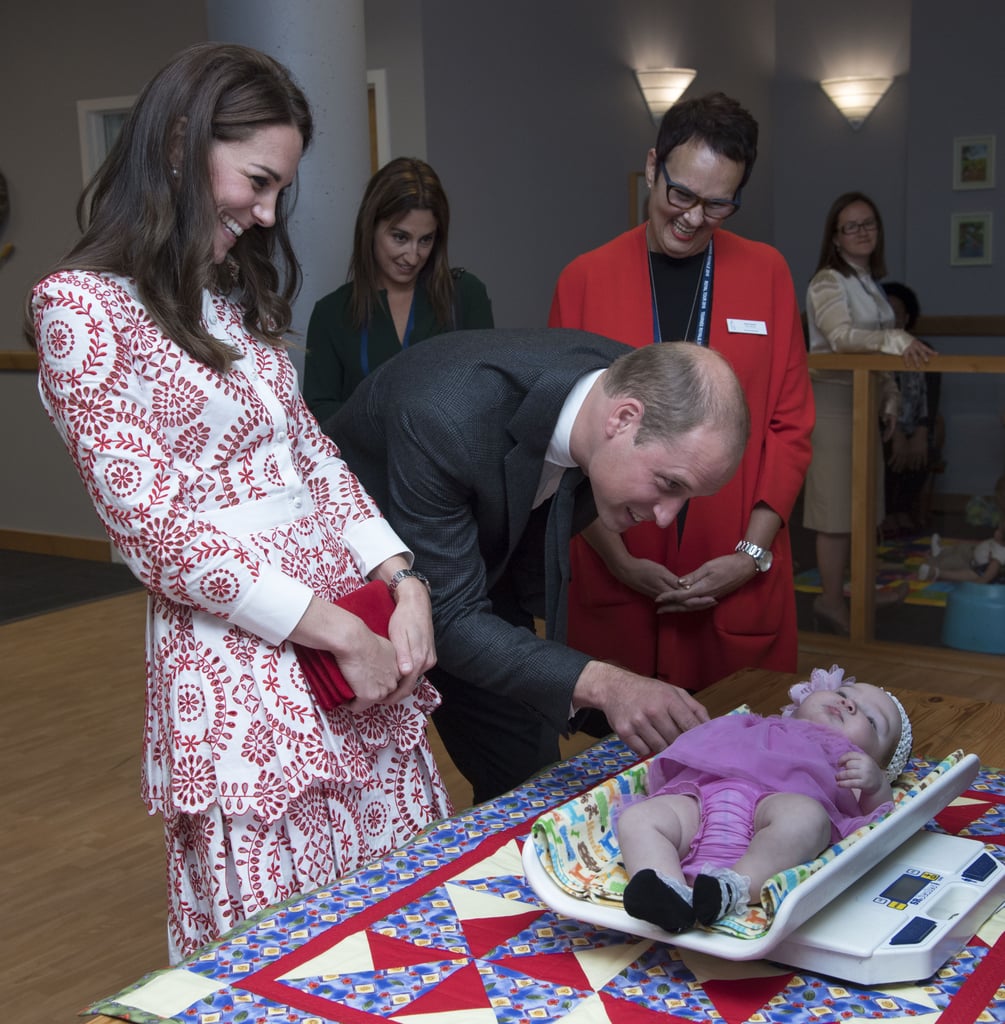 Kate and Will bonded with a baby girl while she got weighed during their Canada tour in September 2016.