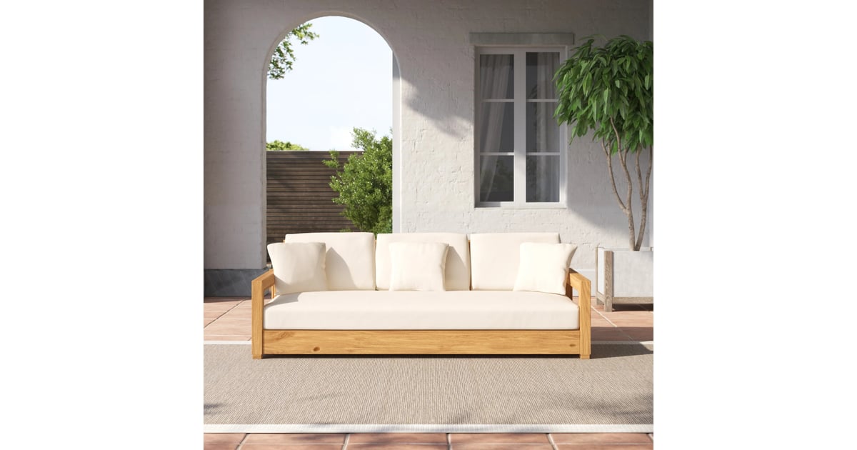 An Outdoor Sofa Ortega Wide Outdoor Teak Patio Sofa With Cushions
