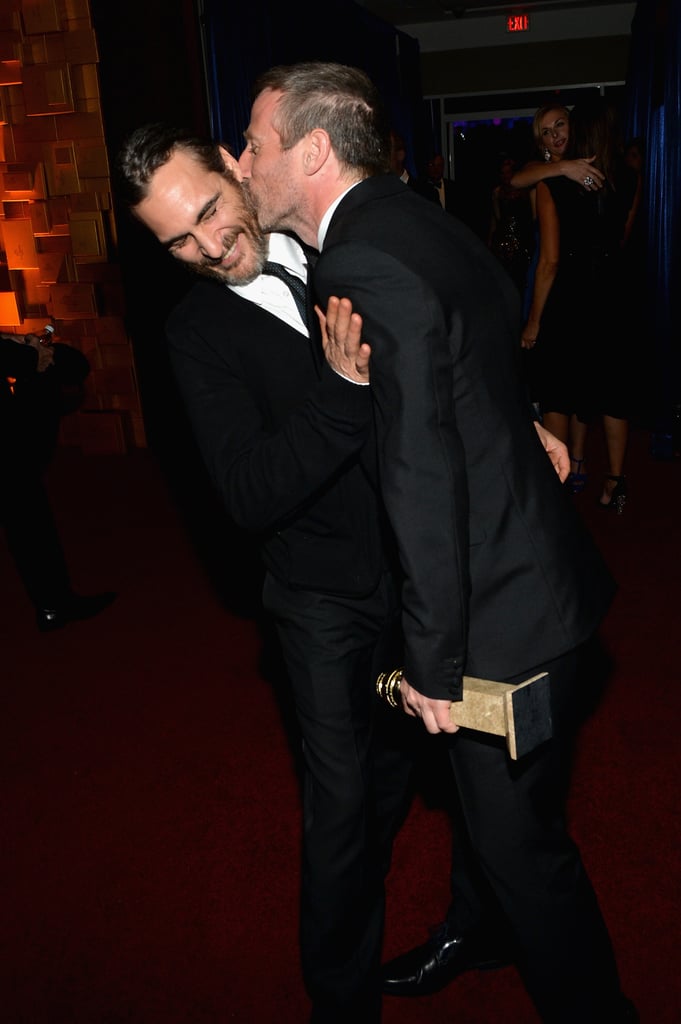 Spike Jonze gave Joaquin Phoenix a kiss.