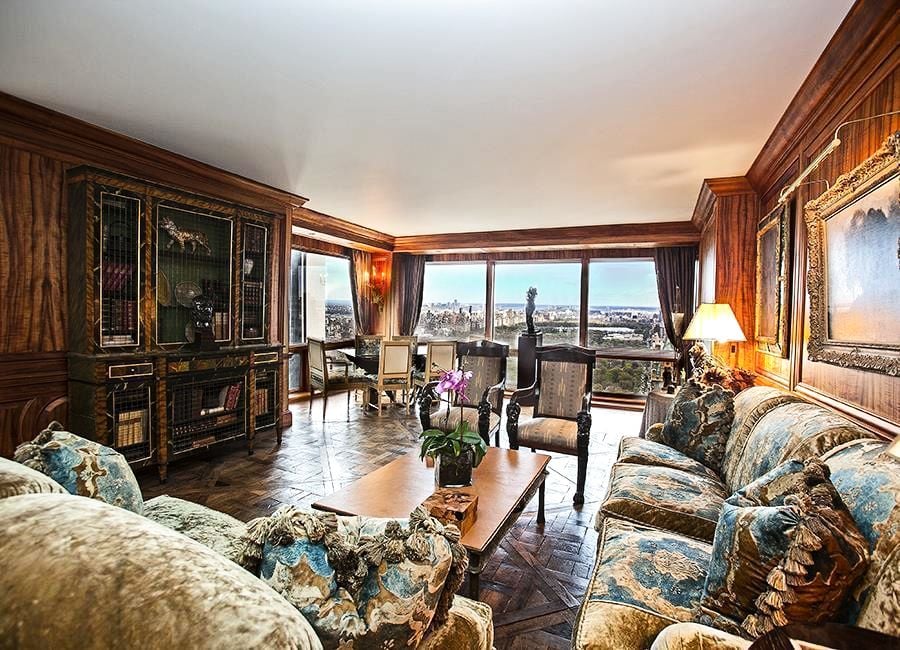The apartment is currently decorated in a baroque, rich style.