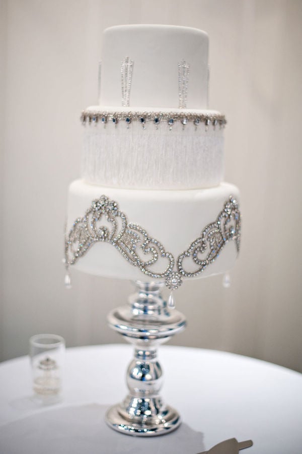 This romantic cake is dripping in elegance and is almost — emphasis on almost — too pretty to eat. 
Photo by Kristen Weaver Photography via Style Me Pretty