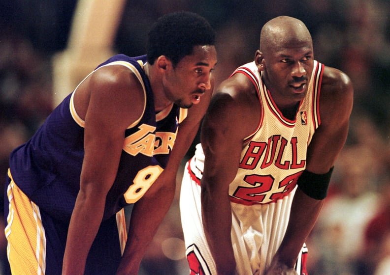 CHICAGO, UNITED STATES:  Los Angeles Lakers guard Kobe Bryant(L) and Chicago Bulls guard Michael Jordan(R) talk during a free-throw attempt during the fourth quarter 17 December at the United Center in Chicago. Bryant, who is 19 and bypassed college baske