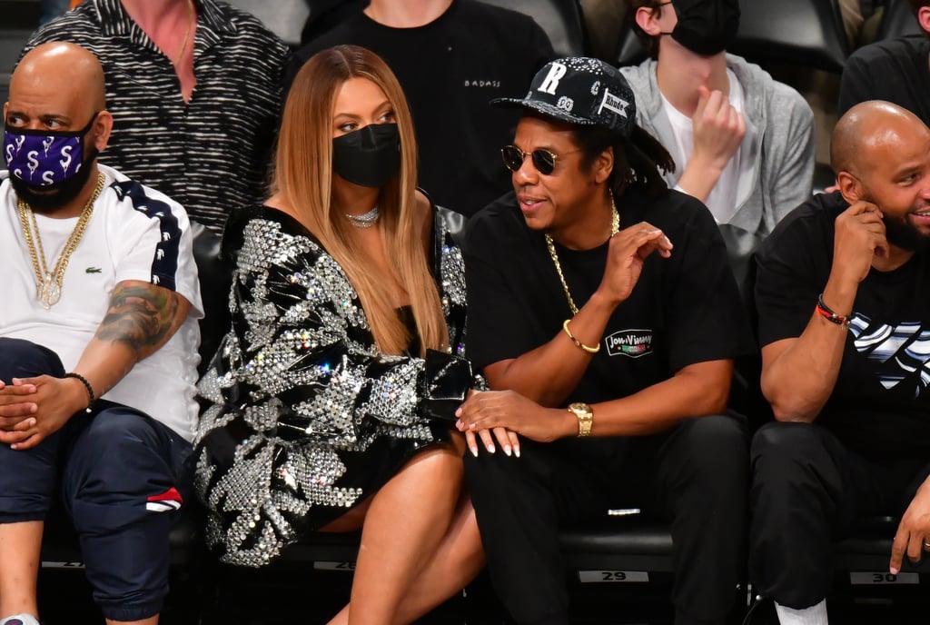 Beyoncé and JAY-Z Cuddle Up at Brooklyn Nets Game | Photos