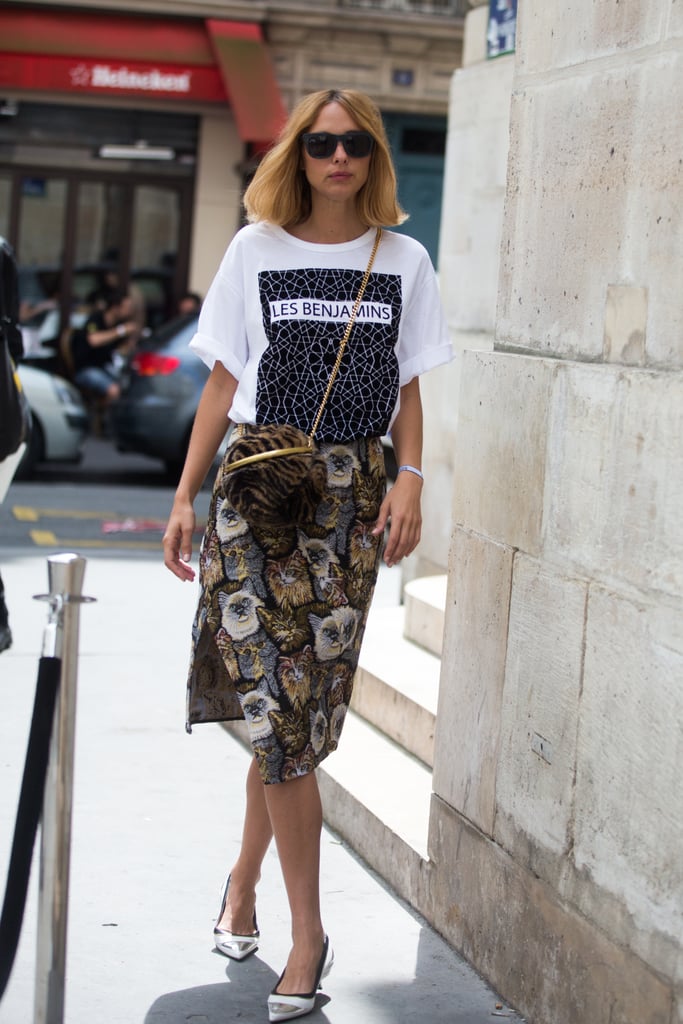 Add a basic tee to your girlie skirts.