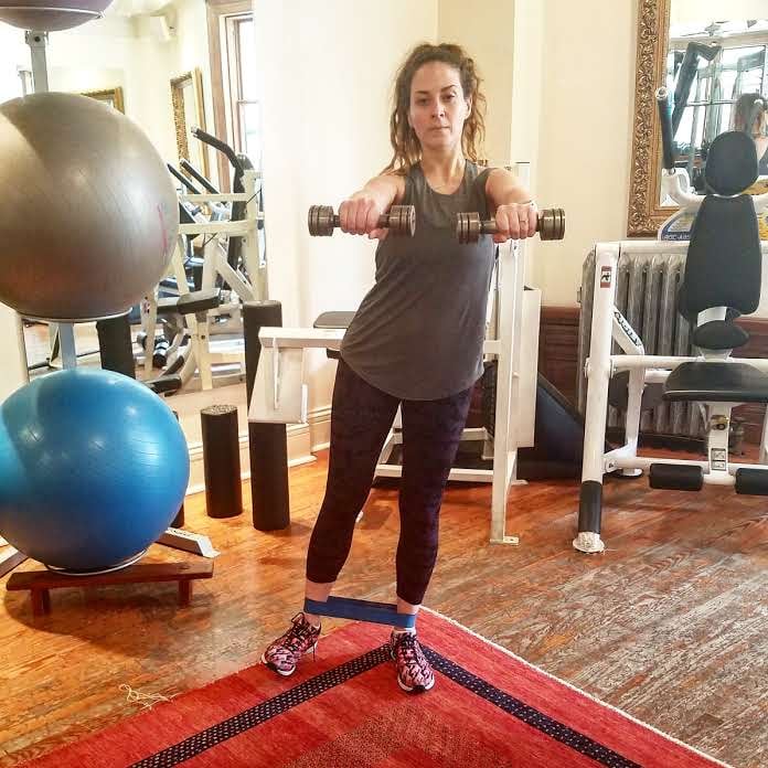 Why it’s effective: “This is another one of my favorite combination moves because as you abduct your leg, you are shaping and toning your outer thigh. And while you do front raises, you shape and tone your arms and the front part of your shoulders. Added bonus for engaging your core throughout the exercise.”