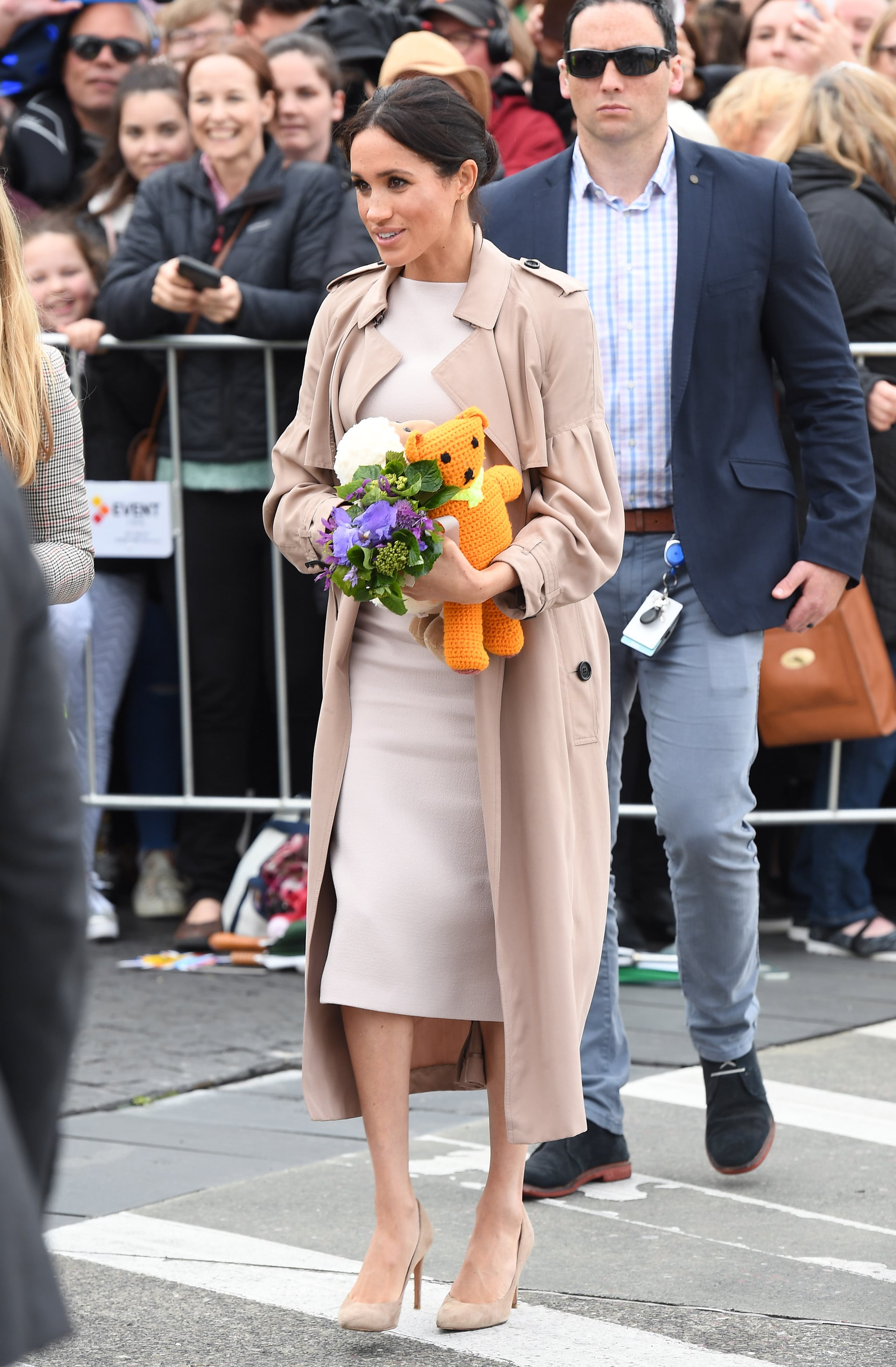 In New Zealand, Meghan covered a lighter-toned Brandon Maxwell dress, Meghan  Markle Lives by These Style Rules, Whether She Knows It or Not
